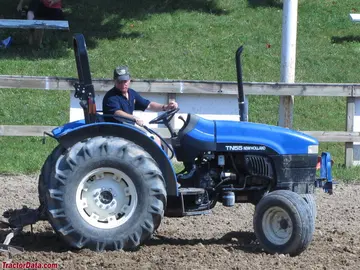 New Holland TN55, perfil derecho