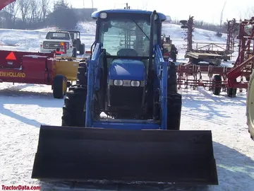 New Holland TN75S mit 33LA Frontlader.
