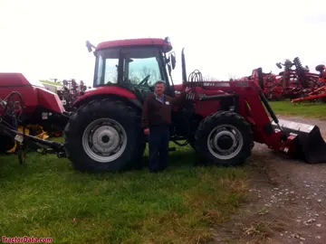 Case IH JX80 mit L730 Frontlader.